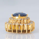 Pendente vintage in oro giallo 18K con zaffiro (1.40ct ca.) e diamanti di taglio brillante (0.57ctw ca.), anni ‘70