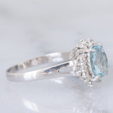 Anello a margherita vintage in platino con acquamarina (1.09ct) e diamanti (0.10ctw), anni ‘80/‘90