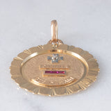 Ciondolo vintage “Plus qu’hier moins que demain” in oro giallo 18K con diamante e rubini