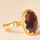 Solitario vintage in oro giallo 18K con granato, anni ‘40/‘50