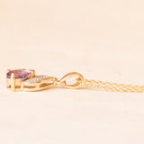 Collana vintage con catenina in oro giallo 9K e con ciondolo in oro giallo e bianco 9K con ametista (0.35ct ca.) e diamanti, anni ‘70