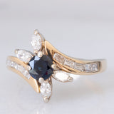 Anello a fiore vintage in oro giallo 14K con zaffiro (0.50ct ca.) e diamanti (0.90ctw ca.), anni ‘70/‘80