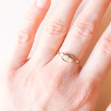 Trilogy bypass antico in oro giallo e bianco 15K con diamanti (0.12ctw ca.), anni ‘20