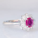 Anello a margherita vintage in platino con rubino (0.33ct) e diamanti (0.57ctw), anni ‘70