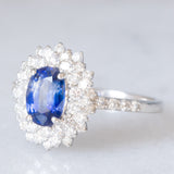 Anello a margherita vintage in platino con zaffiro (1.20ct) e diamanti (0.80ctw), anni ‘90