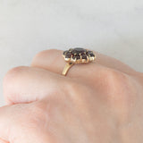 Anello a fiore vintage in oro giallo 8K con granati (2ctw ca.), anni ‘50/‘60