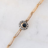 Braccialetto semirigido retrò in oro giallo 14K a argento con zaffiro (1ct ca.) e diamanti di taglio rosetta (0.36ctw ca.), anni ‘40/‘50