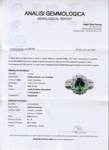Anello a fiore vintage in platino con smeraldo (0.81ct) e diamanti (0.93ctw), anni ‘80