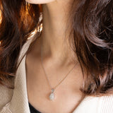 Collana vintage in platino con ciondolo con diamanti (0.56ctw), anni ‘80/‘90