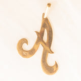 Ciondolo vintage a forma di “A” in oro giallo 9K, anni ‘70