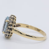 Anello a margherita vintage in oro giallo 9K con acquamarina (2ct ca.) e diamanti (0.18ctw ca.), anni 2000