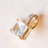 Ciondolo vintage in oro giallo e bianco 14K con topazio azzurro (2ct ca.) e diamanti (0.03ctw ca.), anni ‘70