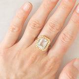 Anello a margherita vintage in oro giallo 14K con acquamarina (3.30ct ca.) e diamanti (0.22ctw ca.), anni ‘70