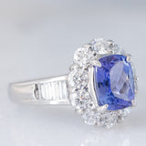 Anello a margherita vintage in platino con tanzanite (2.04ct) e diamanti di taglio brillante e baguette (1.35ctw), anni ‘90