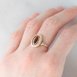 Anello vintage in oro giallo 14K con granato di taglio marquise (0.50ct ca.), anni ‘60