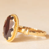 Solitario vintage in oro giallo 18K con granato, anni ‘40/‘50