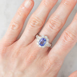 Anello a margherita vintage in platino con tanzanite (2.04ct) e diamanti di taglio brillante e baguette (1.35ctw), anni ‘90