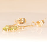 Orecchini pendenti vintage in oro giallo 9K con peridoti verde chiaro (0.70ctw ca.)