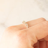 Anello intrecciato in oro bianco 9K con diamanti (0.05ctw ca.), anni ‘80