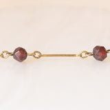 Collana vintage in oro giallo 8K e granati, anni ‘50/‘60