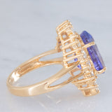 Anello ballerina vintage in oro giallo 14K con tanzanite (5.60ct ca.) e diamanti di taglio brillante e tapered (1.30ctw ca.), anni ‘70/‘80