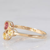 Trilogy astrattato in oro giallo 8K con topazi colorati (0.30ctw ca.), anni ‘70/‘80