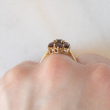 Anello a fiore vintage in oro giallo 8K con granati (1.10ctw ca.), anni ‘70