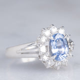 Anello a margherita vintage in platino con zaffiro (1.10ct) e diamanti (0.33ctw), anni ‘70