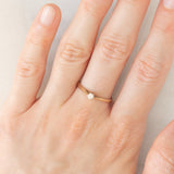 Solitario vintage in oro giallo 9K con diamante di taglio brillante (0.10ct ca.), anno 1982