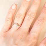 Anello vintage a nodo in oro bianco 9K con diamanti (0.06ctw ca.), anni ‘90