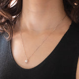 Collana con catenina in oro bianco 18K con punto luce in oro bianco 18K e con diamante di taglio vecchio (0.46ct ca.)