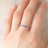 Eternity arcobaleno in oro bianco 18K con zaffiri (1.30ctw ca.)