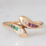 Anello contrarier antico a doppio serpente in oro giallo 14K con smeraldi, rubini e diamanti di taglio vecchio (0.16ctw ca.), anni ‘20