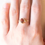 Anello vintage in oro giallo e bianco 9K con granato e cubic zirconia, anni ‘70/‘80