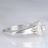 Anello a fiore vintage in platino con diamanti di taglio brillante (0.32ctw), anni ‘70/‘80