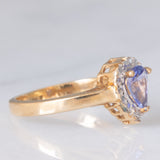Anello a margherita vintage in oro giallo e bianco 9K con tanzanite (0.60ct ca.), anni ‘90