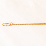 Braccialetto semirigido in oro giallo 14K con smeraldi (0.50ctw ca.) e diamanti (0.02ctw ca.), anni ‘70/‘80