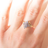 Anello vintage in oro giallo e bianco 9K con tanzaniti (0.70ctw ca.) e diamanti (0.02ctw ca.), anno 2003