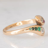 Anello contrarier antico a doppio serpente in oro giallo 14K con smeraldi, rubini e diamanti di taglio vecchio (0.16ctw ca.), anni ‘20