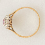 Anello a margherita vintage in oro giallo 9K con rubino (0.35ct ca.) e diamanti (0.06ctw ca.), anno 1984