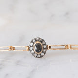 Braccialetto semirigido retrò in oro giallo 14K a argento con zaffiro (1ct ca.) e diamanti di taglio rosetta (0.36ctw ca.), anni ‘40/‘50