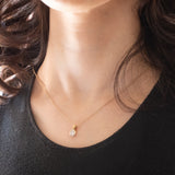 Ciondolo punto luce vintage in oro giallo e bianco 18K con diamante di taglio brillante (0.25ct ca.)