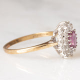 Anello a margherita vintage in oro giallo 9K con rubino (0.40ct ca.) e diamanti (0.28ctw ca.), anno 1987