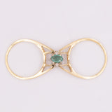 Raro anello girevole 2 in 1 in oro giallo e bianco 18K con smeraldo (0.30ct ca.) e diamanti di taglio brillante (0.20ctw ca.), anni ‘70/‘80