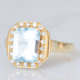 Anello vintage in oro giallo 14K con topazio azzurro (2.80ct ca.) e diamanti di taglio brillante (0.16ctw ca.), anni ‘80/‘90