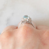 Anello a margherita vintage in platino con acquamarina (1.09ct) e diamanti (0.10ctw), anni ‘80/‘90