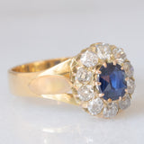 Anello a margherita antico in oro giallo 14K con zaffiro (0.40ct ca.) e diamanti di taglio vecchia miniera (0.70ctw ca.), anni ‘20/‘30
