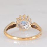Anello a margherita vintage in oro giallo 9K con zaffiro (0.35ct ca.) e diamanti (0.14ctw ca.), anni ‘80