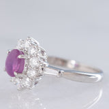 Anello a margherita vintage in platino con rubino stellato (1.35ct) e diamanti (0.66ctw ca.), anni ‘90