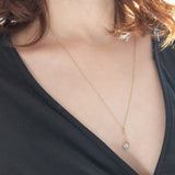 Collana con catenina vintage in oro giallo 9K e con ciondolo antico in oro giallo 9K con acquamarina (0.70ct ca.)